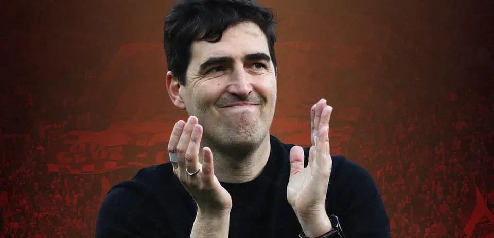 Coach applauding fans after a match