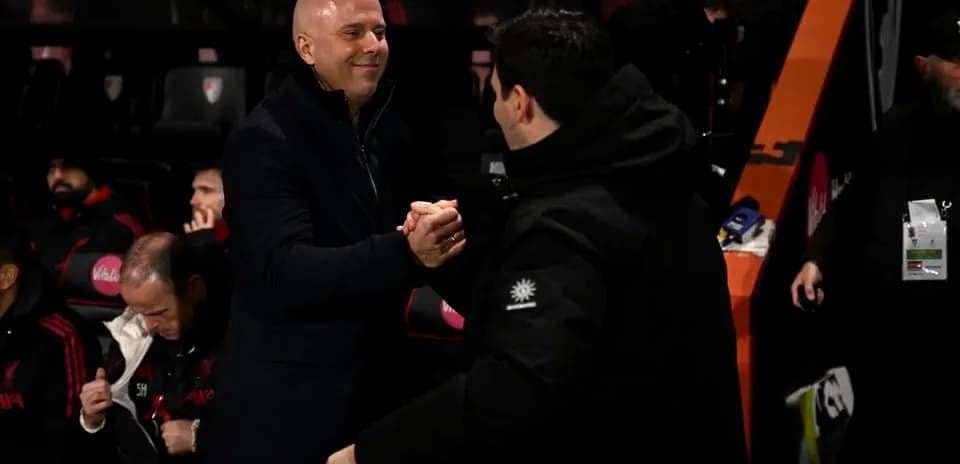 Coaches shaking hands on the sidelines