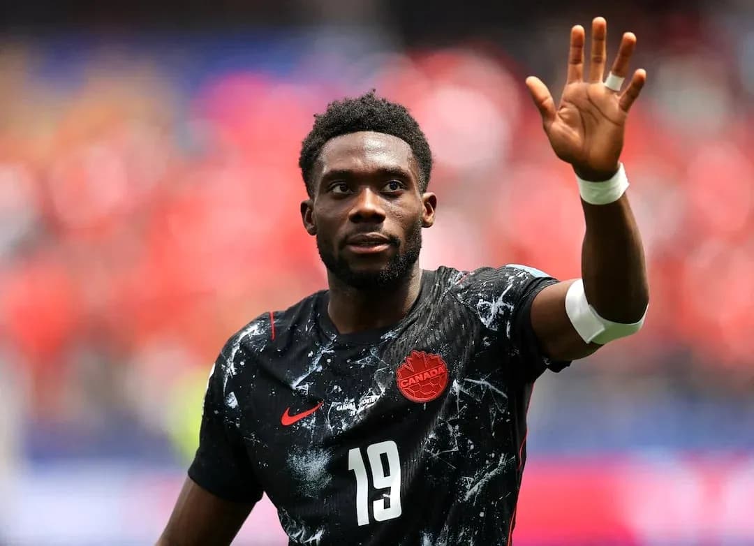 Canadian player waving during football match