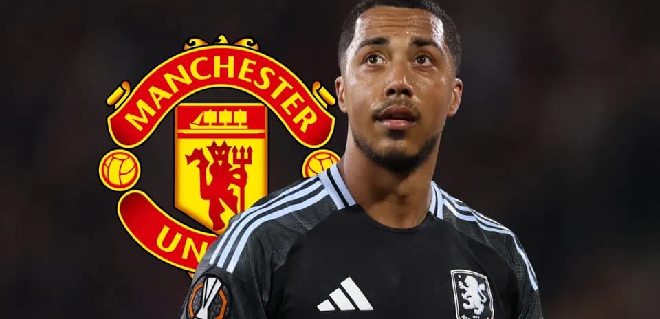 Aston Villa player with Manchester United logo backdrop