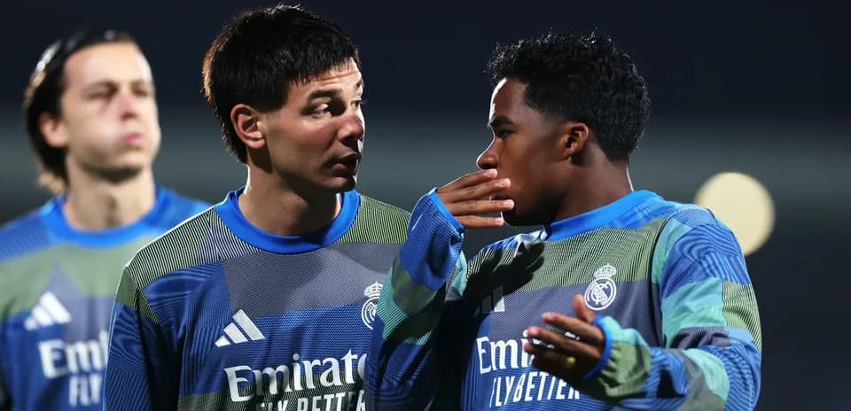 Two players talking during training session