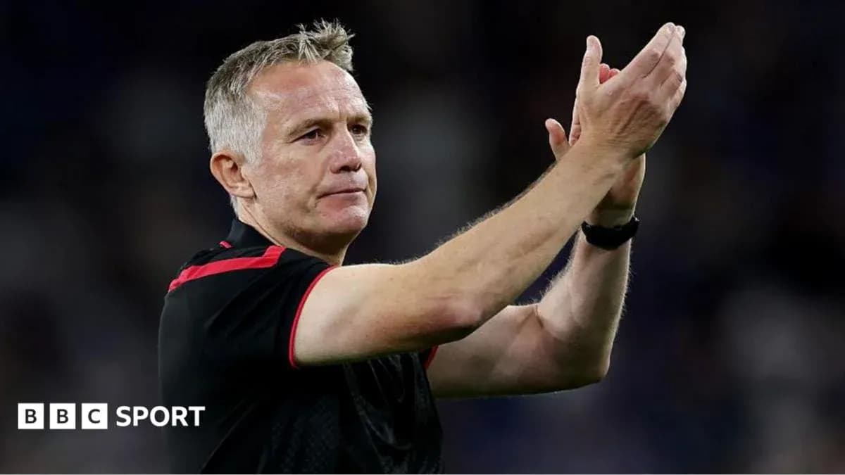 Coach applauding after match on the field