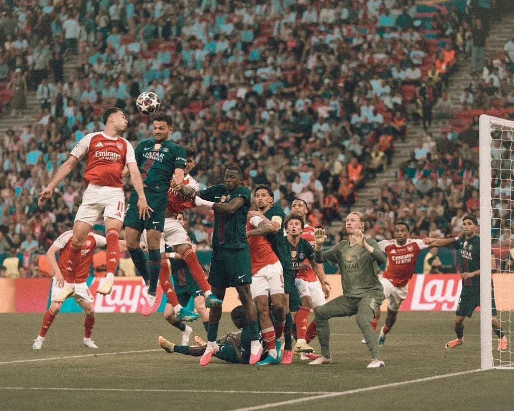 Players contesting a high ball during a match