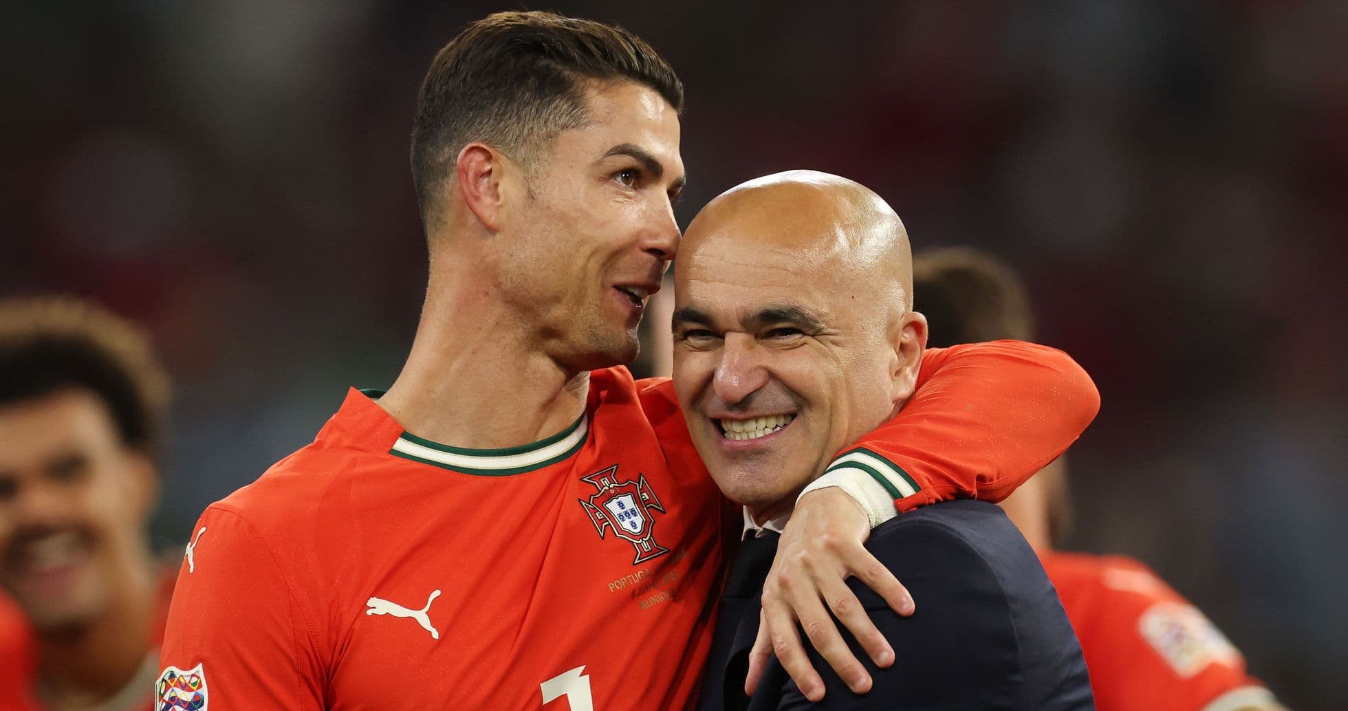 Cristiano Ronaldo and coach celebrating together