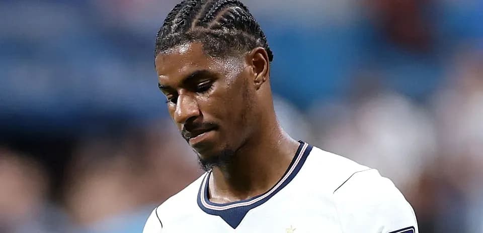 Player looking down during a football match