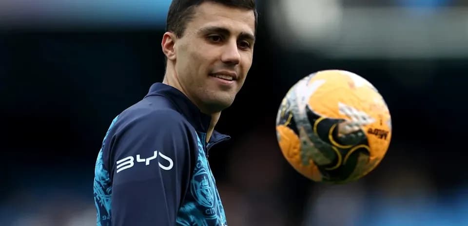Player juggling a football during training session