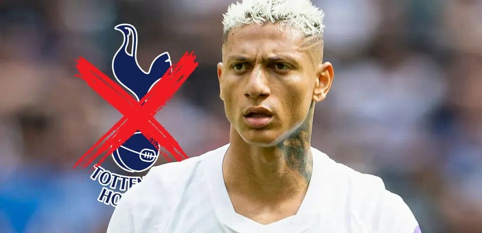 Player with blonde hair and tattoos on pitch