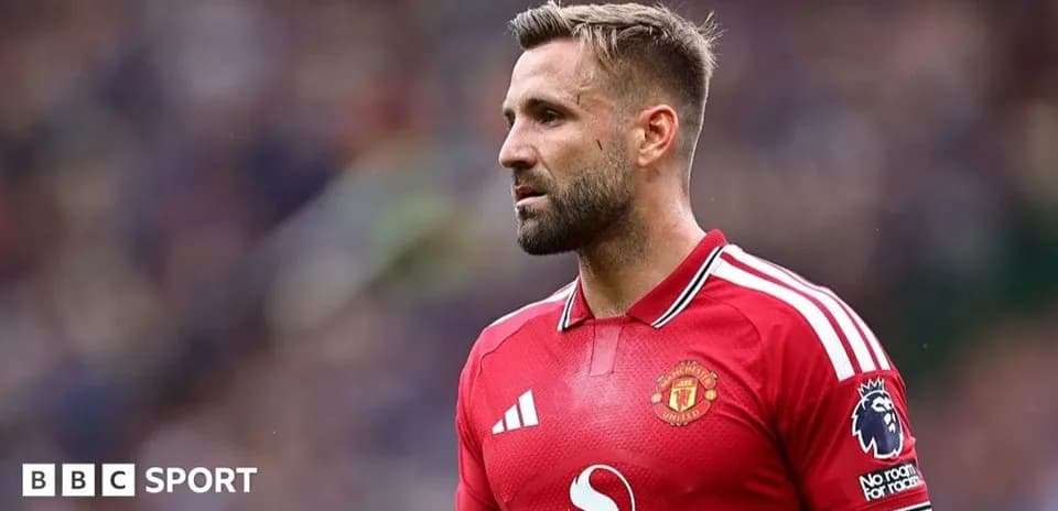 Player in red Manchester United jersey during match