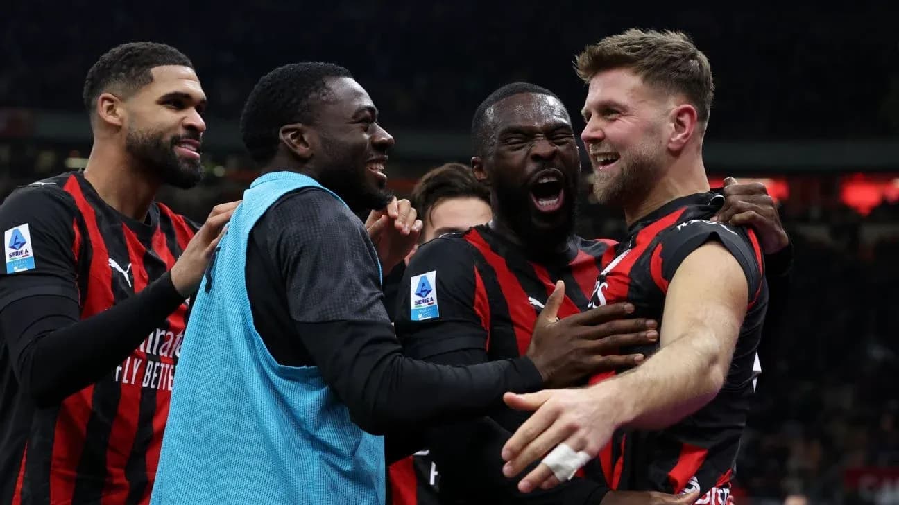 AC Milan players celebrating a goal during match