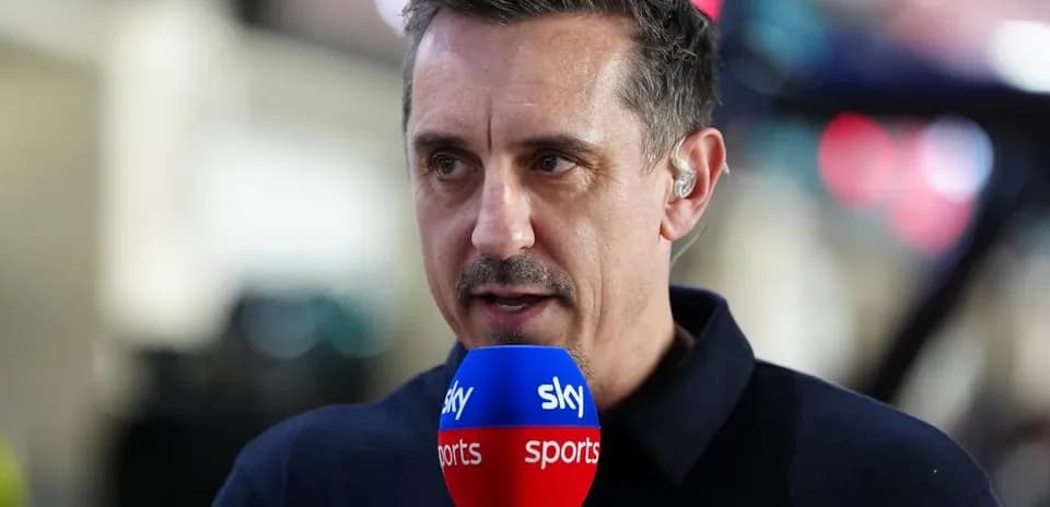 Sports commentator speaking into microphone on set