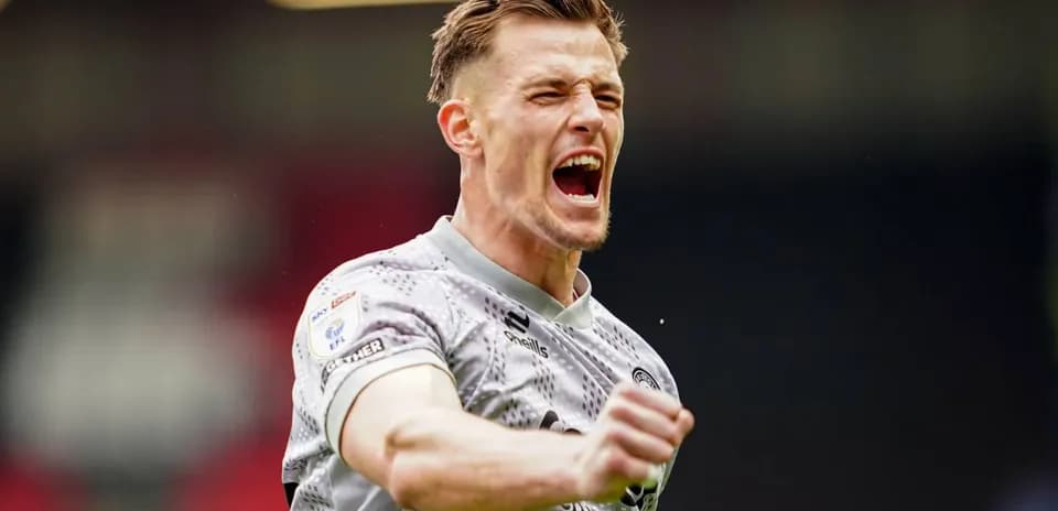 Goalkeeper celebrating a save during a match