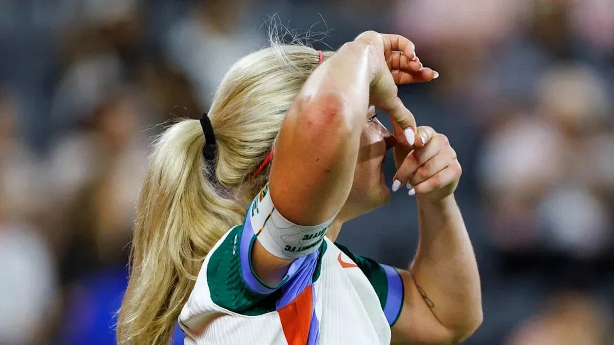 Athlete adjusting headband during a match