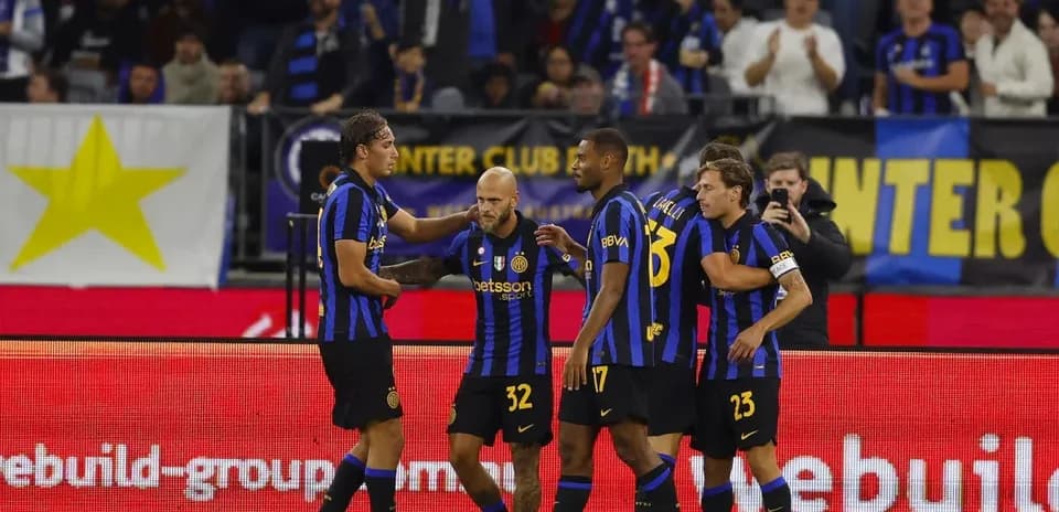 Inter players celebrating a goal on the field