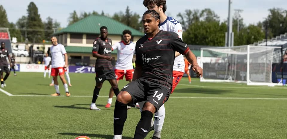 Player controlling the ball during match
