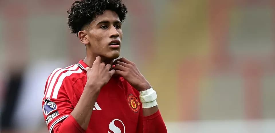 Young player adjusting his jersey during match