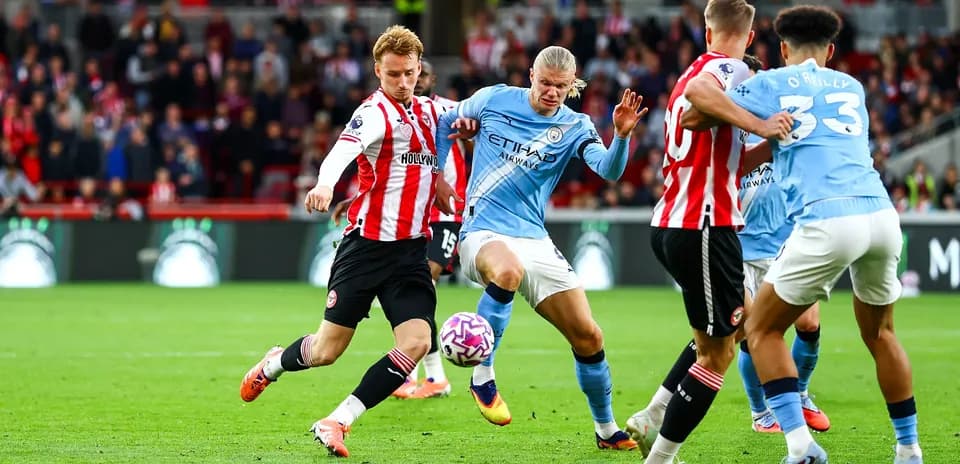 Manchester City player in action against Brentford