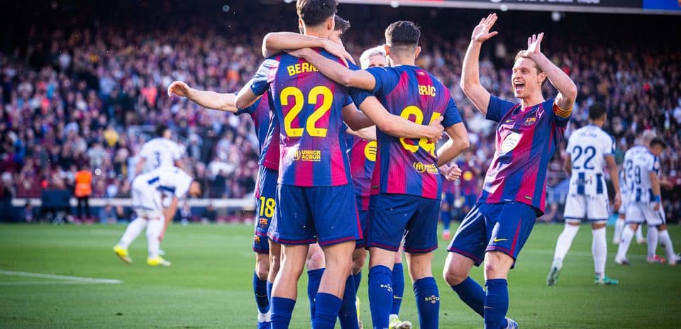 Barcelona players celebrating a goal against Levante