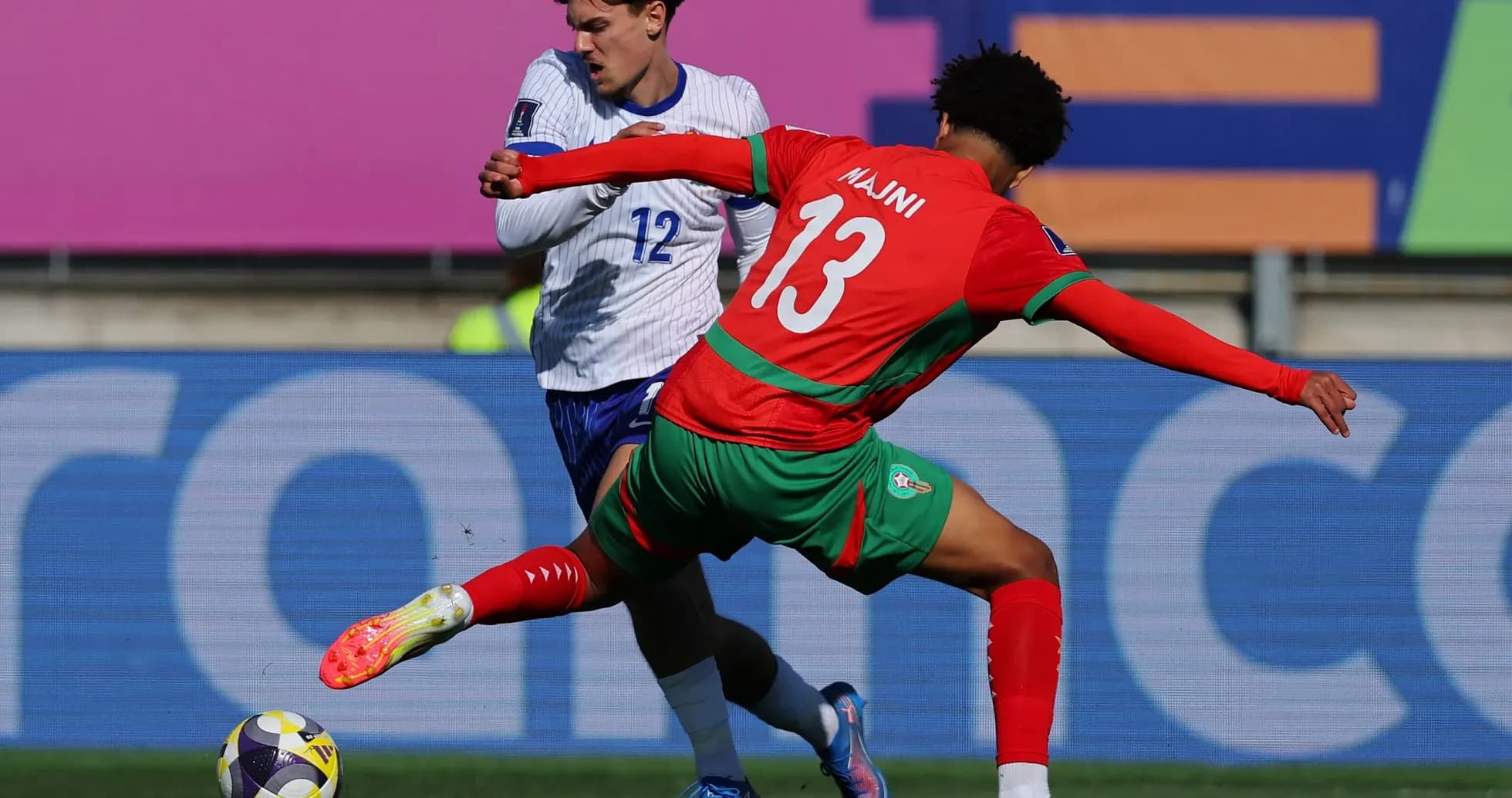 Player tackling opponent during a football match