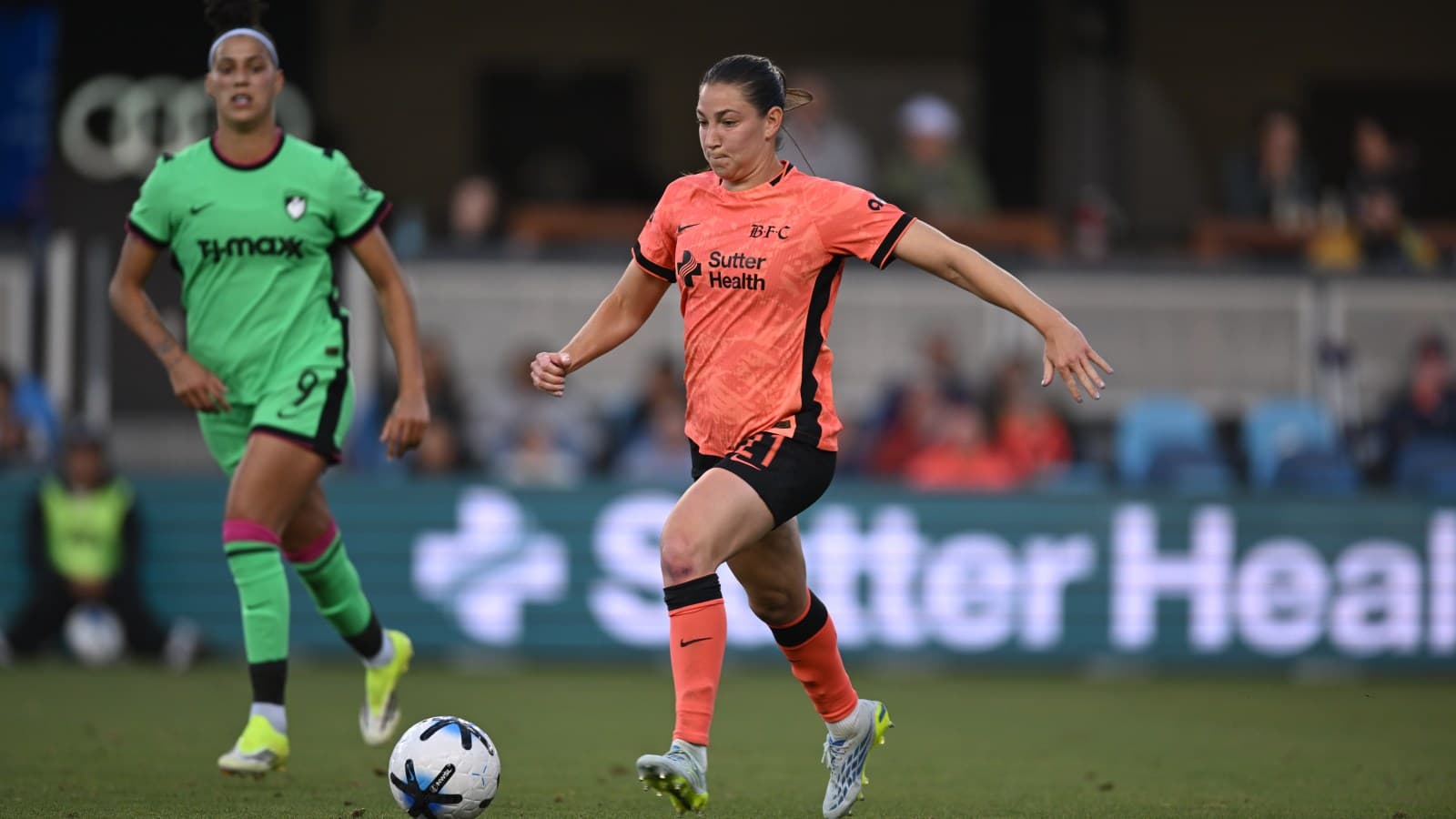 Player from Bay FC dribbling the ball