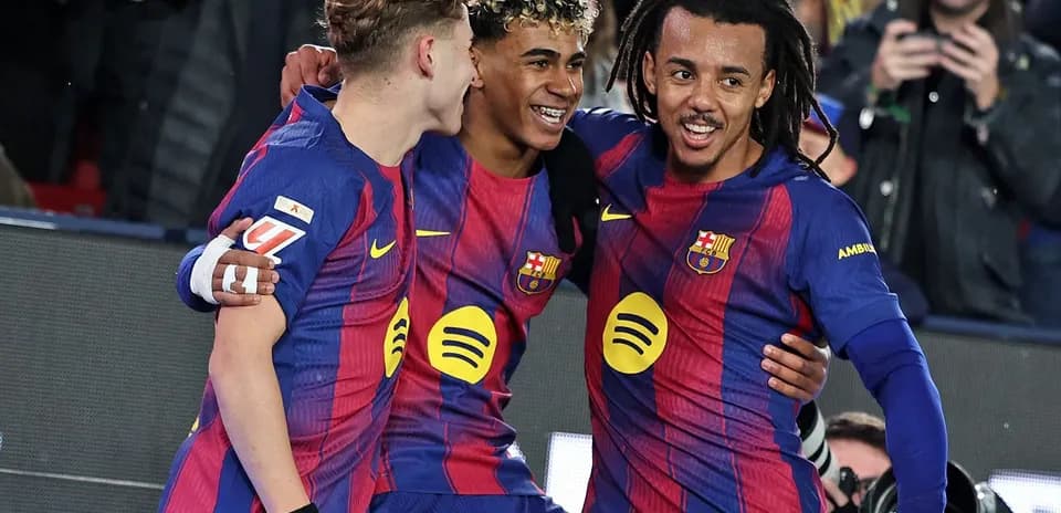 Barcelona players celebrating after scoring a goal