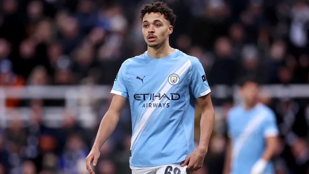 Player in Manchester City kit on the field