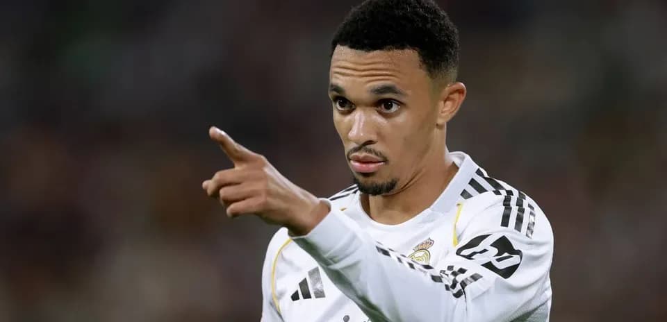 Player gesturing during match in Real Madrid kit