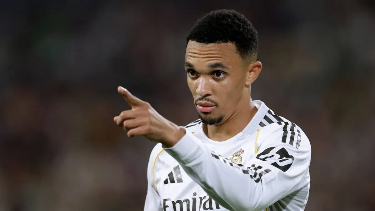 Player gesturing during match in Real Madrid kit