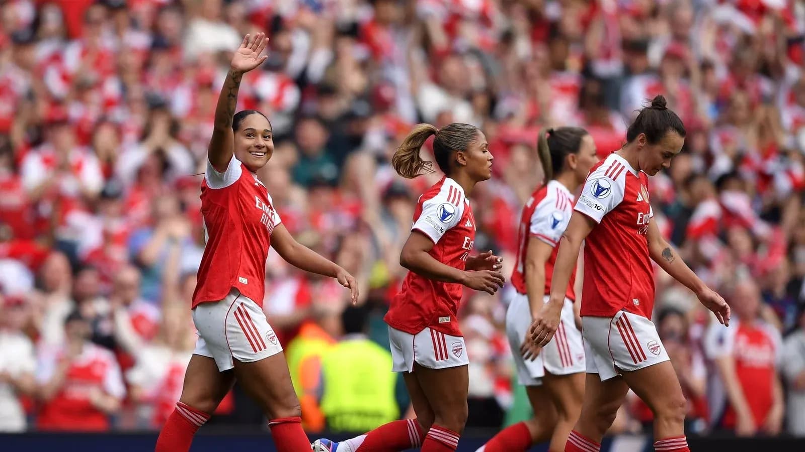 Arsenal players celebrating during a match