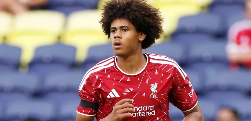 Player in Liverpool kit warming up before match