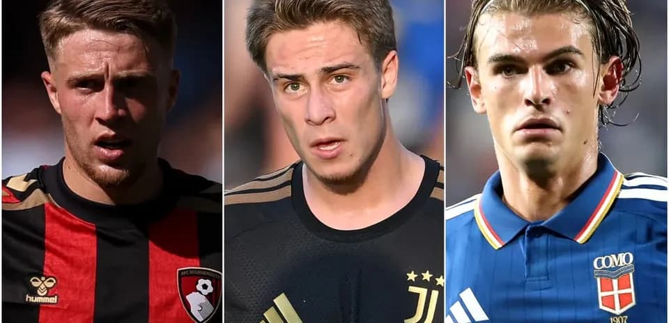 Three football players in club jerseys posing for camera