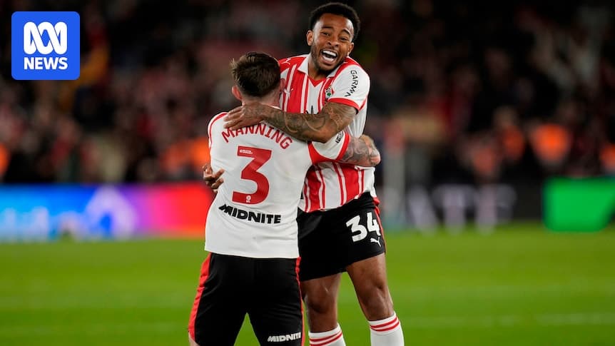 Players celebrating after a match in team jerseys