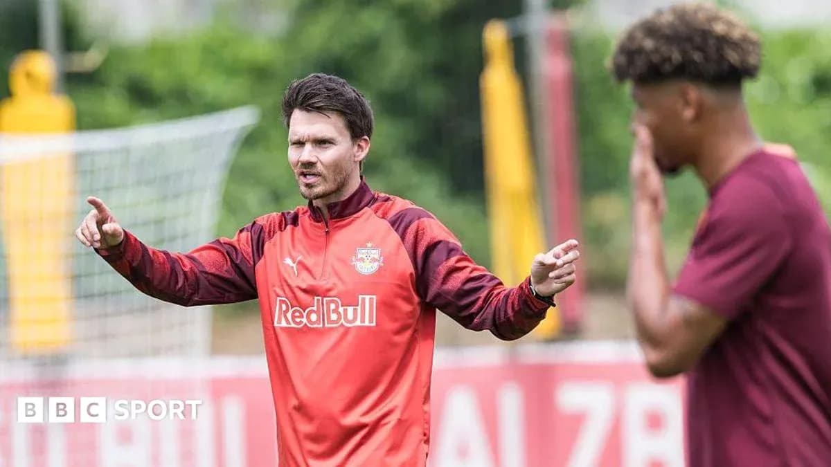 Coach giving instructions during training session