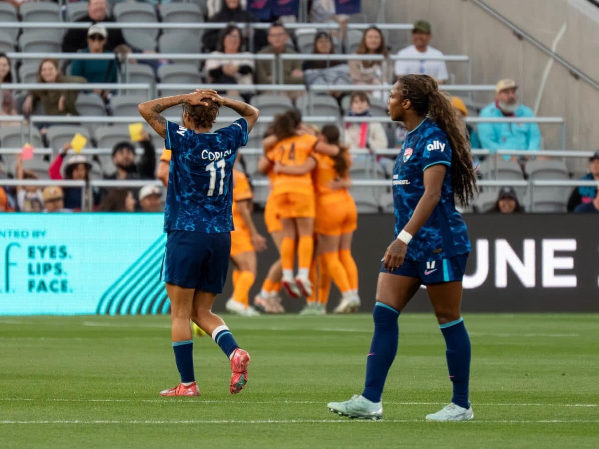 Houston Dash players reacting during match against San Diego Wave