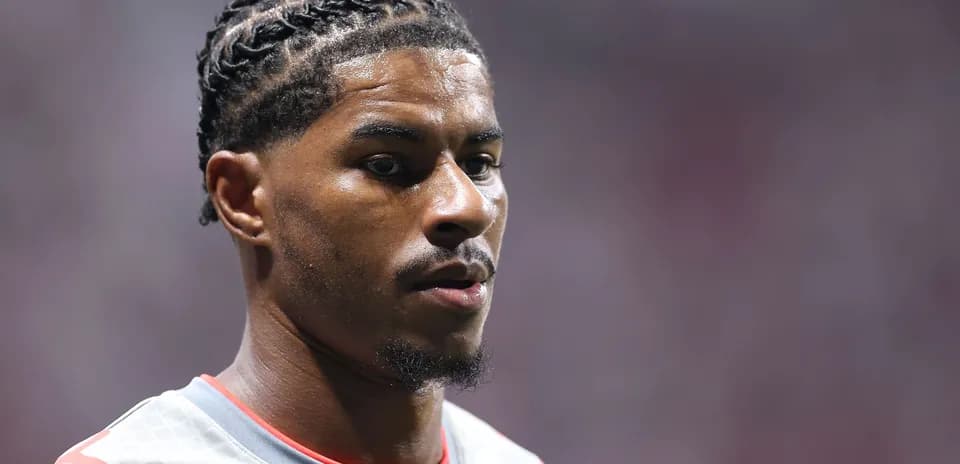 Player with braided hair in sports uniform