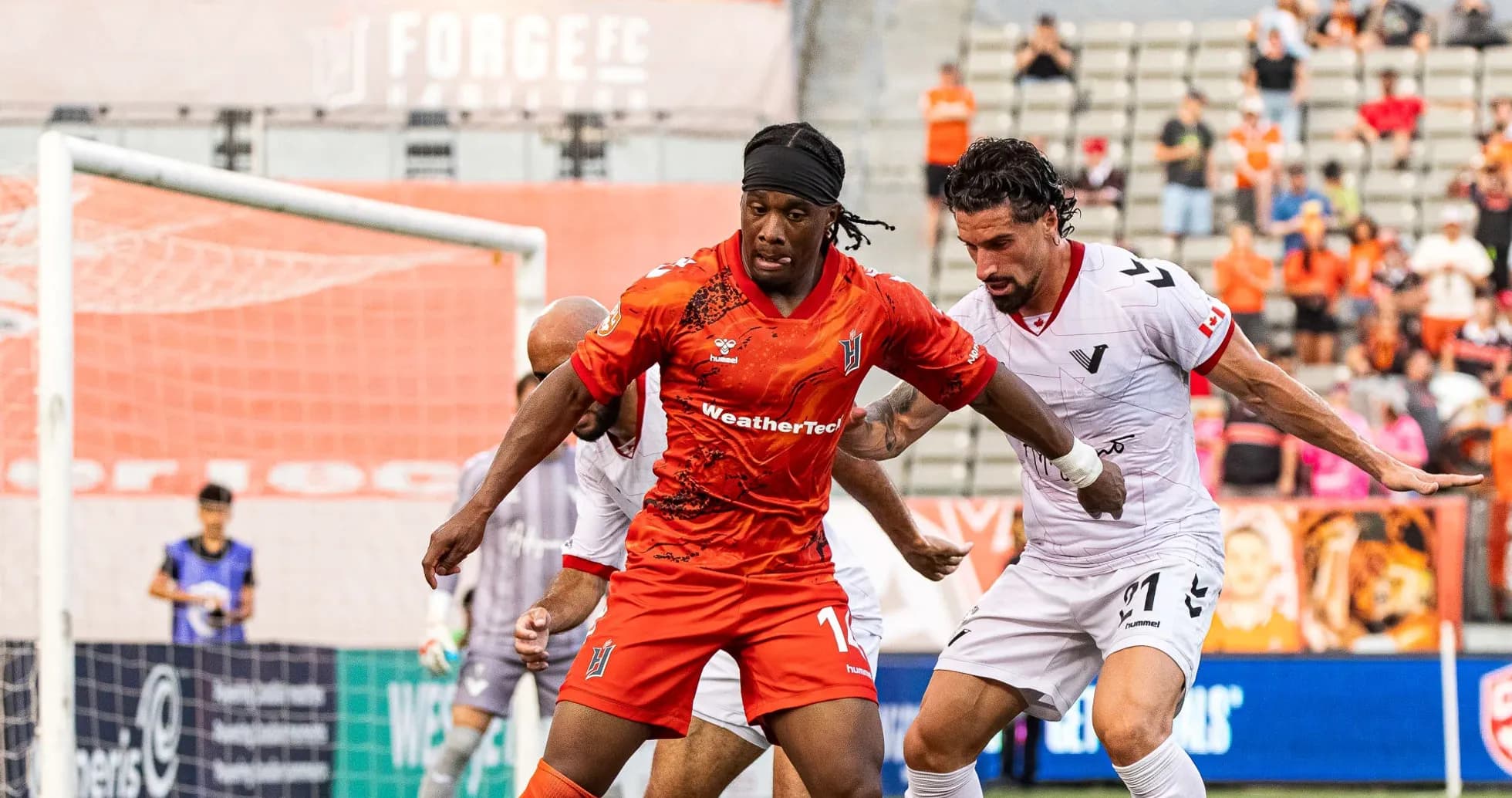 Players competing during Vancouver FC vs Forge match