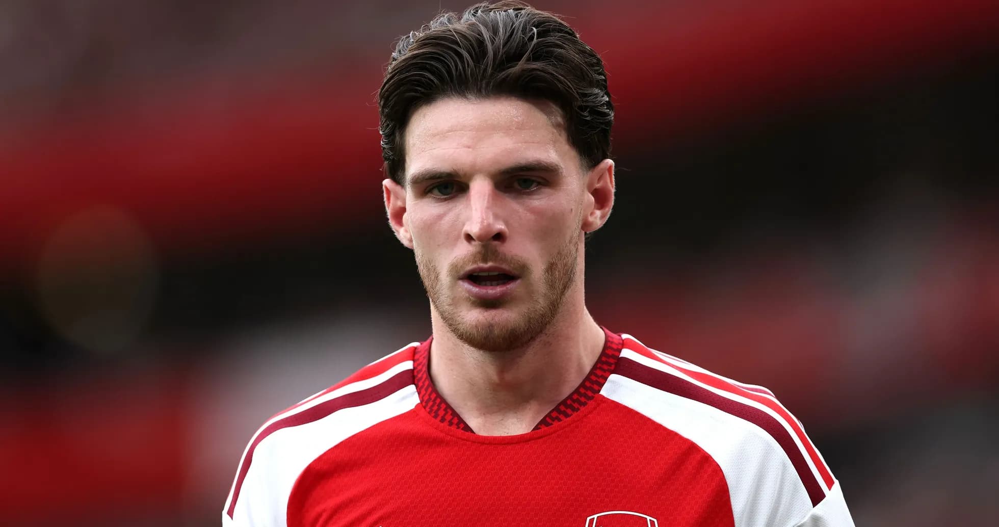 Player wearing Arsenal jersey during match