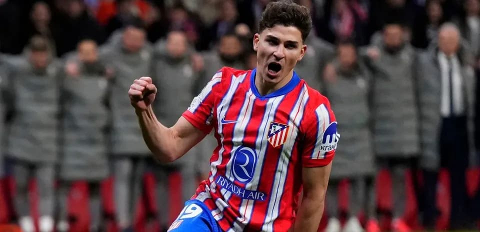 Player celebrating after scoring a goal for Atlético