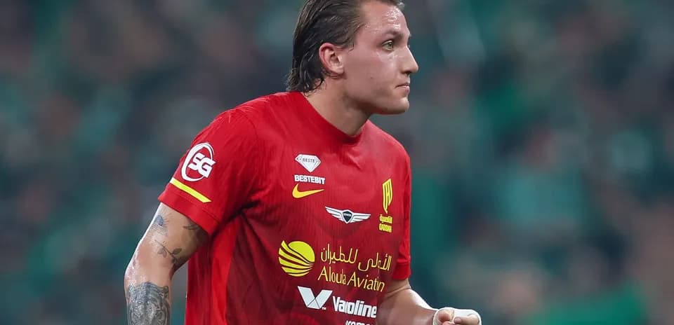 Player in red jersey during a match