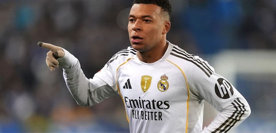 Player gesturing during match in Real Madrid kit