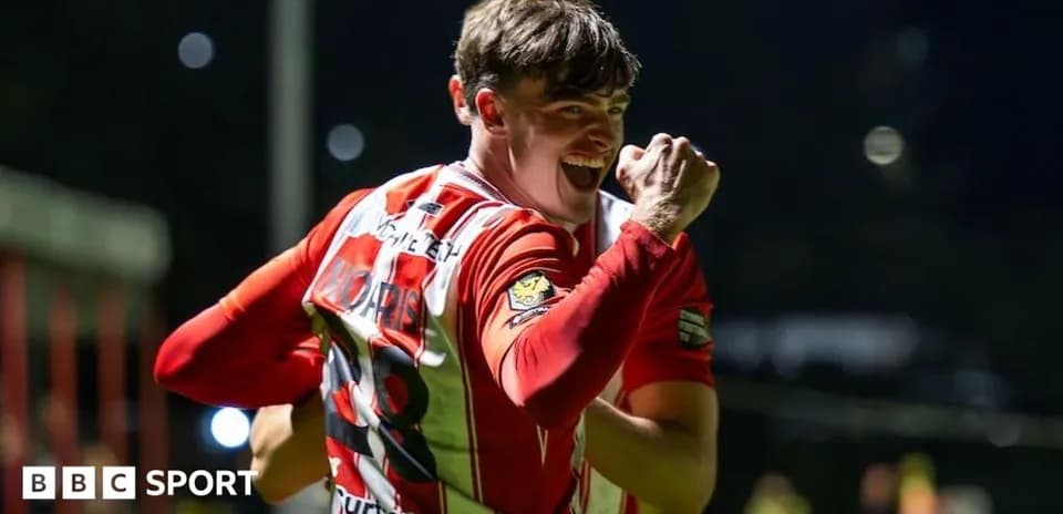 Player celebrating with clenched fist after scoring