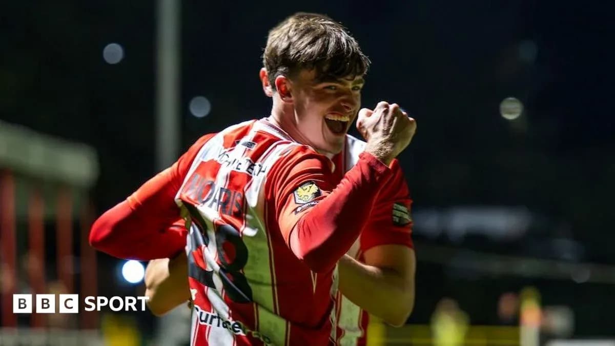 Player celebrating with clenched fist after scoring
