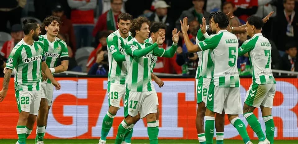 Real Betis players celebrating a goal on field