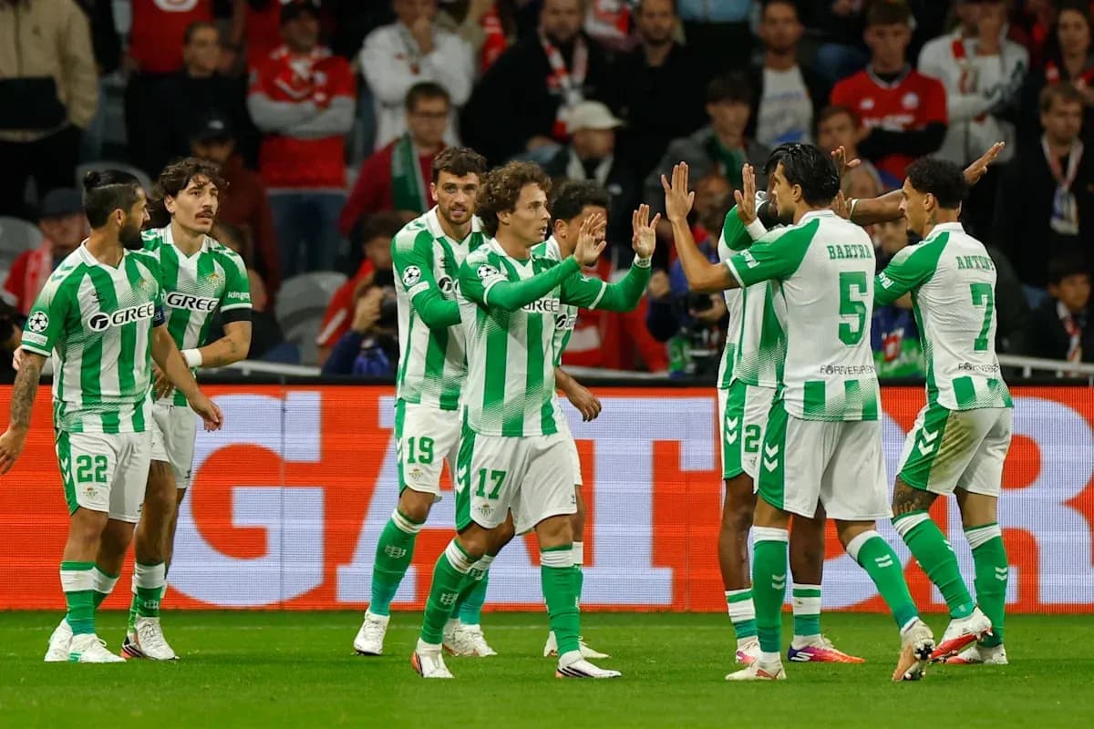 Real Betis players celebrating a goal on field