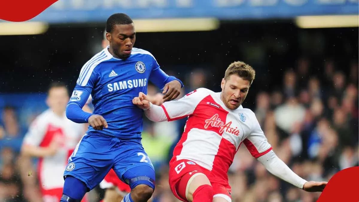 Two players competing for the ball during match