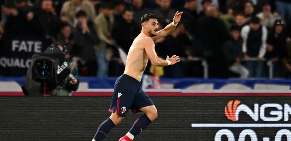 Bologna player celebrating after scoring a goal