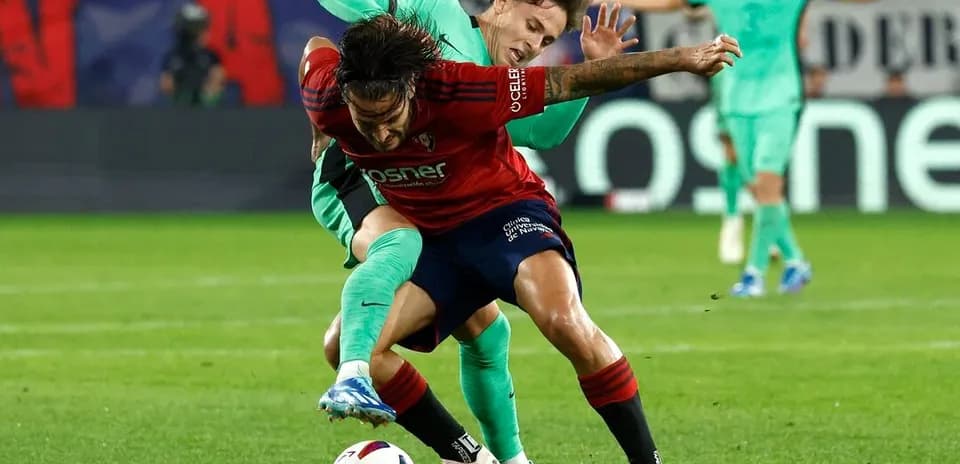 Players contesting for the ball during match