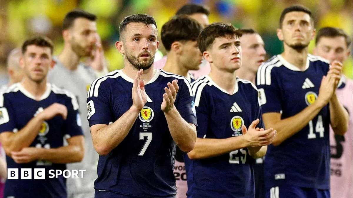 Scotland players applauding after match conclusion