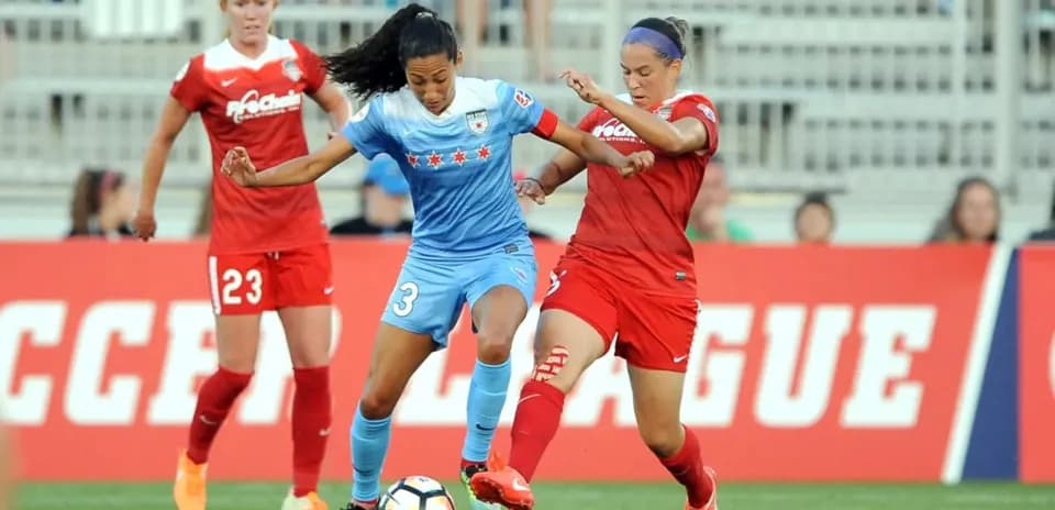 Chicago Red Stars player battling for possession