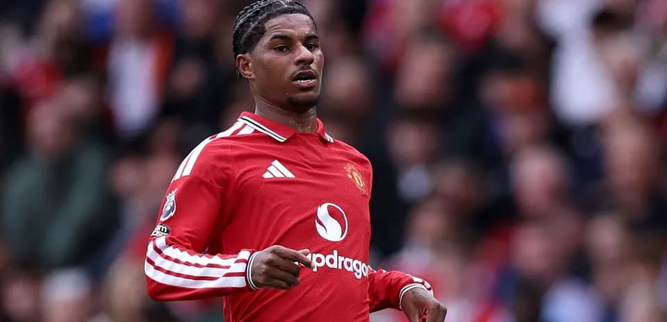 Player in red Manchester United kit during match