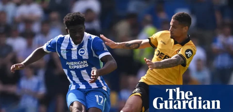 Brighton player dribbling past opposing defender during match